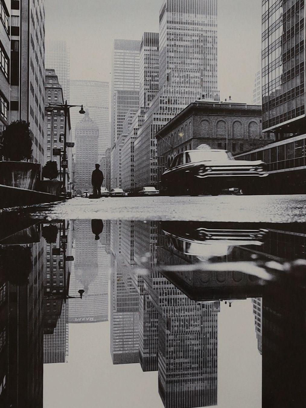 Mario de Biasi, three black and white photographs, '42nd Street', 'Park Avenue' and 'Brooklyn Bridge', overall 28 x 20cm